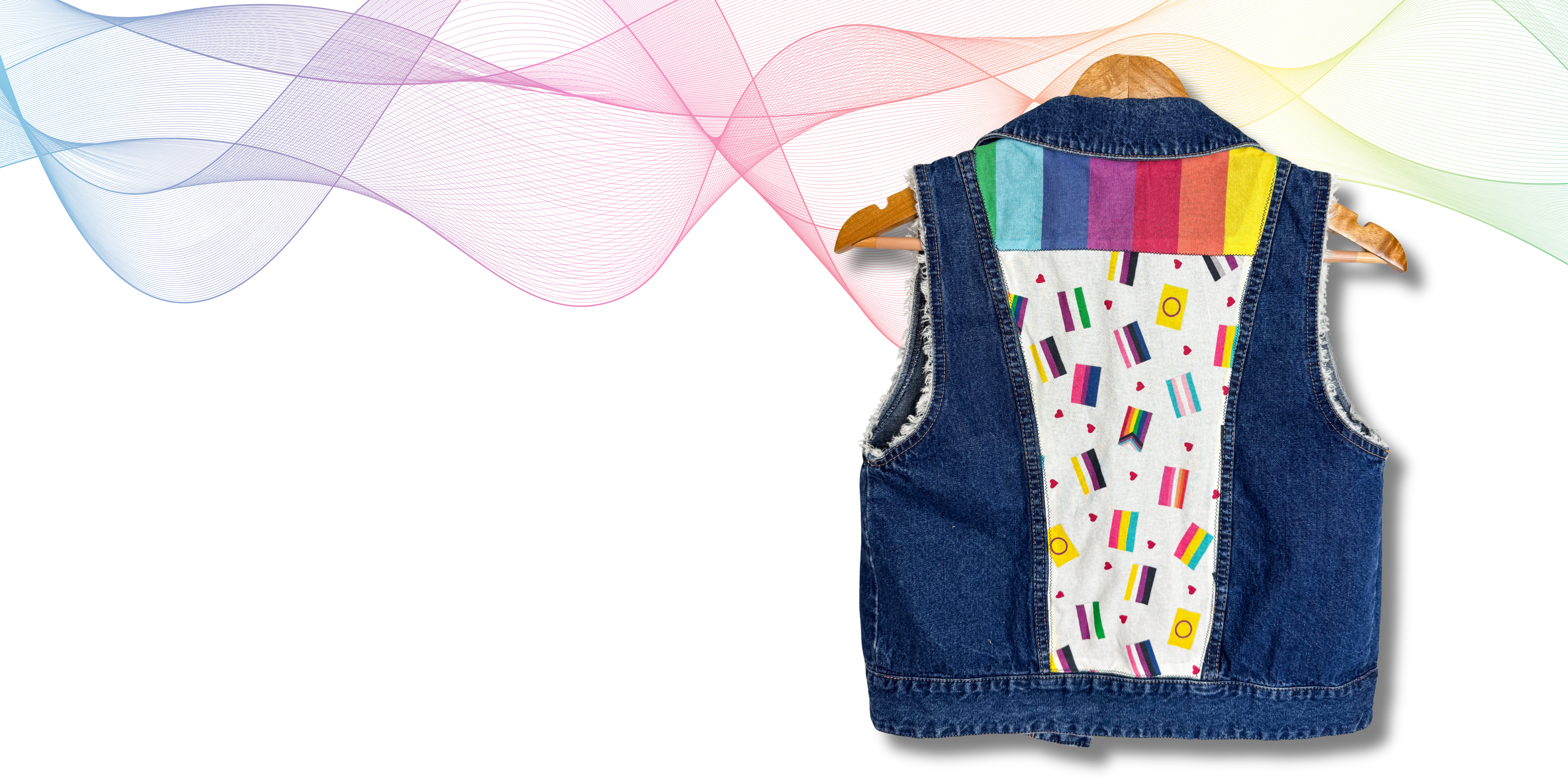 Adult cropped denim vest with Pride flag motifs on a white background